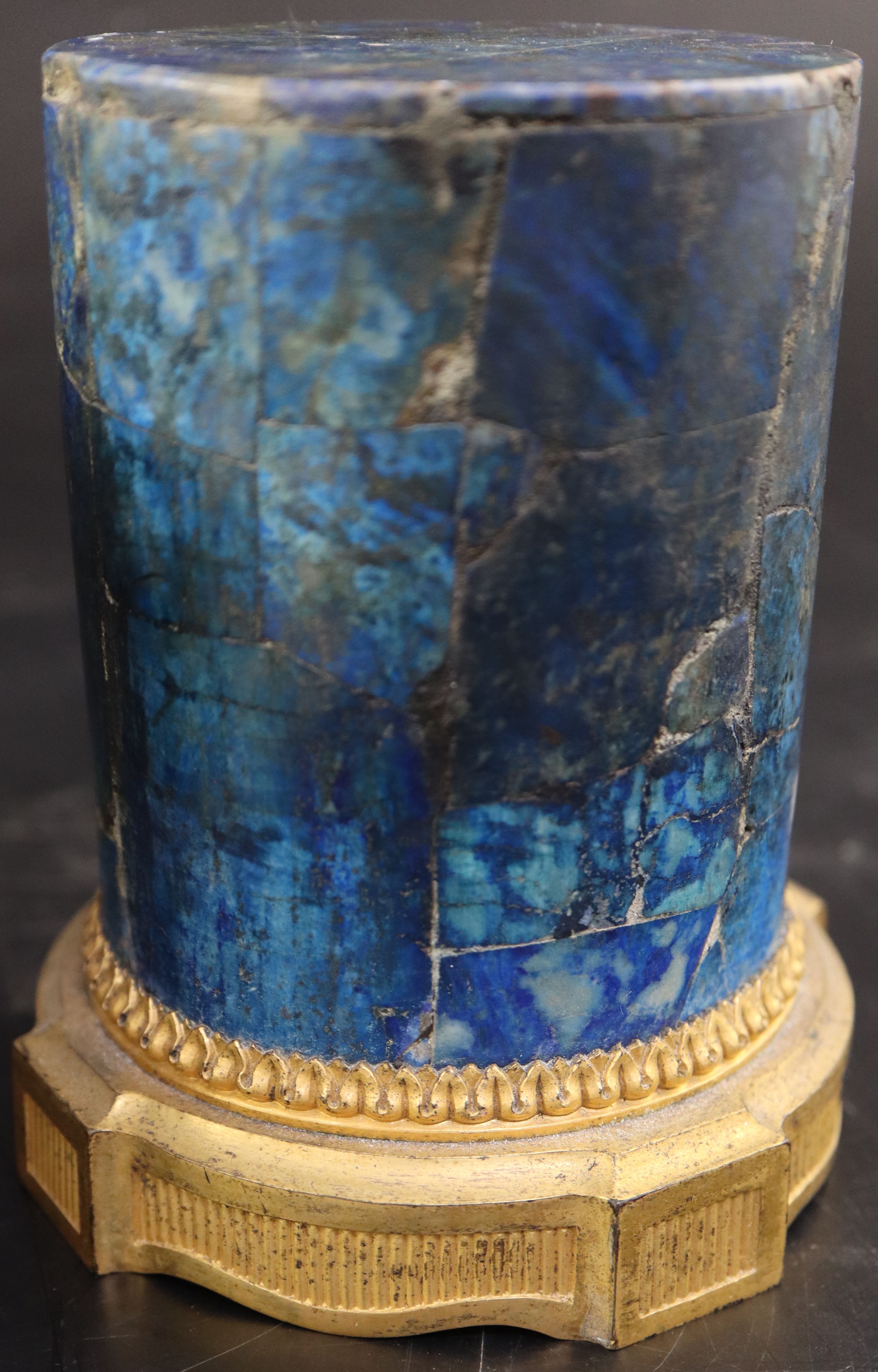 A pair of late 18th century ormolu mounted lapis lazuli socles, diameter 10cm height 12.5cm